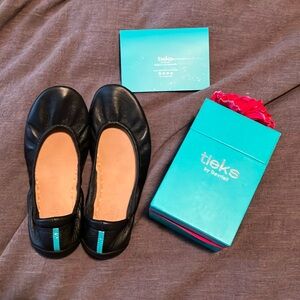 Black Tieks flats, size 7